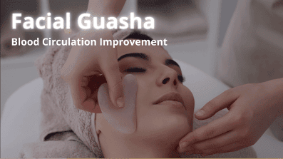 A smooth pink quartz stone being used to contour the jawline and improve circulation during a facial in Mississauga.