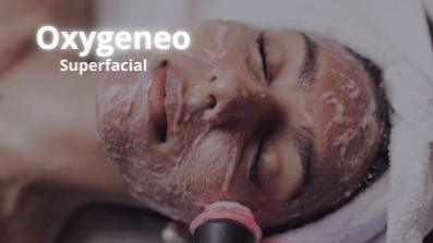A patient resting with a thick, bubbling exfoliation treatment applied to their face at Sunshine Cosmetic Clinic & Medi Spa.
