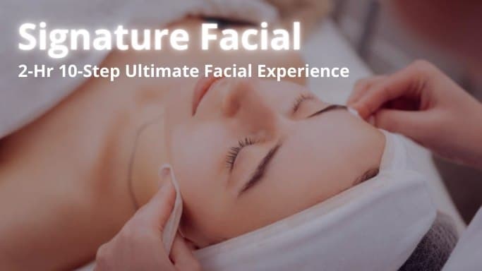 Gentle manual facial massage being performed on a relaxed client as part of an intensive 10-step Signature Facial in Mississauga.